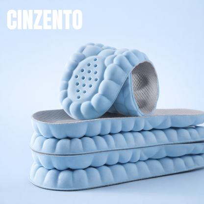 Shock-absorbing massage insoles