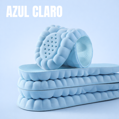 Shock-absorbing massage insoles