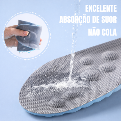Shock-absorbing massage insoles