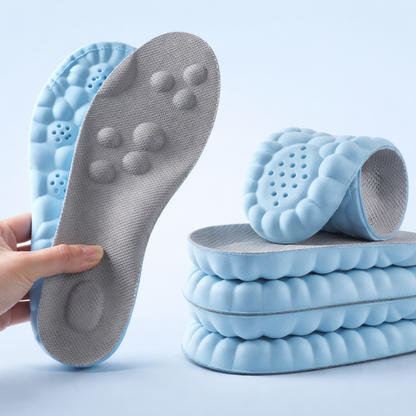Shock-absorbing massage insoles
